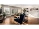 Bright and stylish living room features concrete floors, french doors, and neutral wall colors at 1513 W Mitchell Dr, Phoenix, AZ 85015