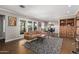 Inviting living room with a comfortable sofa, dining area, and bright windows at 1513 W Mitchell Dr, Phoenix, AZ 85015