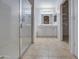 Bathroom featuring double sinks, a bathtub and a shower, offering a spa-like experience at 15443 N 86Th Ln, Peoria, AZ 85382