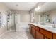Spacious bathroom with shower, tub, double sinks, and neutral tones at 1737 S Talbot --, Mesa, AZ 85209