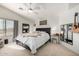 Bright bedroom with vaulted ceilings, plush carpet, ceiling fan and large window at 1737 S Talbot --, Mesa, AZ 85209