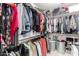 Walk-in closet with organized storage solutions and ample space at 1737 S Talbot --, Mesa, AZ 85209