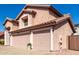 Side angle showing a three-car garage of a charming two-story home at 1737 S Talbot --, Mesa, AZ 85209