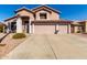 Charming two-story home with a three-car garage and well-maintained landscaping at 1737 S Talbot --, Mesa, AZ 85209