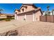 Side angle showing a three-car garage of a charming two-story home at 1737 S Talbot --, Mesa, AZ 85209