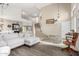 Open-concept living room featuring tiled floors, a staircase, and a comfortable seating area at 1737 S Talbot --, Mesa, AZ 85209
