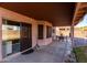 Covered outdoor patio space, perfect for entertaining or relaxing with a table and chairs at 1737 S Talbot --, Mesa, AZ 85209