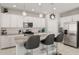 Well-appointed kitchen with granite countertops, stainless steel appliances, and stylish pendant lighting at 17784 W Sandy Rd, Goodyear, AZ 85338