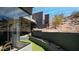 Beautiful turf backyard space with modern desert landscaping features at 1805 E Rocky Slope Dr, Phoenix, AZ 85048