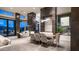 Dining area with modern chandelier, comfortable seating, and scenic outdoor views at 1805 E Rocky Slope Dr, Phoenix, AZ 85048