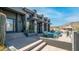 Modern home features sleek architecture and a tranquil patio with stunning views of the natural landscape at 1805 E Rocky Slope Dr, Phoenix, AZ 85048