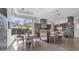 Open concept kitchen with breakfast nook overlooking outdoor scenery and stainless steel appliances at 1805 E Rocky Slope Dr, Phoenix, AZ 85048