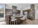 Stylish kitchen featuring modern appliances and spacious island with barstool seating at 1805 E Rocky Slope Dr, Phoenix, AZ 85048