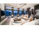 Open living space with views from the wall-to-wall windows and comfortable modern furniture at 1805 E Rocky Slope Dr, Phoenix, AZ 85048