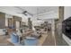 Inviting living room featuring an open layout, stylish decor, and seamless connection to the kitchen and dining areas at 1805 E Rocky Slope Dr, Phoenix, AZ 85048