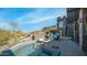 Inviting pool and spa area with mountain views and comfortable patio seating at 1805 E Rocky Slope Dr, Phoenix, AZ 85048