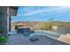 Relaxing backyard with a waterfall feature flowing into the inviting pool at 1805 E Rocky Slope Dr, Phoenix, AZ 85048