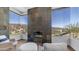 Bright sitting area with modern furniture, floor to ceiling windows and desert views at 1805 E Rocky Slope Dr, Phoenix, AZ 85048