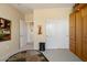Bright bedroom featuring a closet and a storage cabinet at 18514 N Laguna Azul Ct, Surprise, AZ 85374