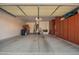 Spacious garage with ample storage cabinets, ready for parking and projects at 18867 N Cactus Flower Way, Surprise, AZ 85387