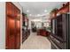 Spacious kitchen boasts dark wood cabinets, sleek black appliances, and ample counter space for cooking at 18867 N Cactus Flower Way, Surprise, AZ 85387