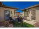 Inviting side yard retreat with seating area on artificial turf at 18867 N Cactus Flower Way, Surprise, AZ 85387