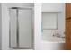 Bathroom with a shower, large soaking tub with jets, and tile flooring at 20838 N 39Th Dr, Glendale, AZ 85308