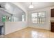 Bright dining area with tile floors and views of the outdoor deck at 20838 N 39Th Dr, Glendale, AZ 85308