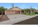 Charming single-story home featuring a well-manicured lawn and a three-car garage for convenience at 20838 N 39Th Dr, Glendale, AZ 85308