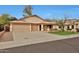 Charming single-Gathering home boasts a 3-car garage, covered front porch, and well-maintained landscaping at 20838 N 39Th Dr, Glendale, AZ 85308