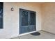 Elegant front entrance featuring decorative iron screen doors and a welcoming doormat at 20838 N 39Th Dr, Glendale, AZ 85308