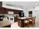 Spacious kitchen featuring a center island with bar seating, granite countertops, and stainless steel appliances at 20838 N 39Th Dr, Glendale, AZ 85308