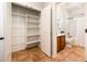 Bathroom featuring vanity, shelving, and shower at 22236 N Arrellaga Dr, Sun City West, AZ 85375