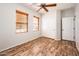 Bedroom featuring sliding closet doors, and neutral paint for a cozy and inviting feel at 22236 N Arrellaga Dr, Sun City West, AZ 85375
