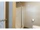 Bathroom featuring a glass-enclosed shower and neutral wall tones for a serene and functional design at 255 S 92Nd Pl, Mesa, AZ 85208