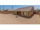 Large backyard with covered patio and block wall fencing at 25536 W Primrose Ln, Buckeye, AZ 85326