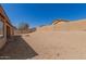 Spacious backyard with block wall fencing at 25536 W Primrose Ln, Buckeye, AZ 85326