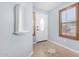 Welcoming entryway features tile flooring and a decorative niche, leading into the home at 25536 W Primrose Ln, Buckeye, AZ 85326
