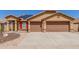 Inviting single-Gathering home with a two-car garage, solar panels, desert landscaping, and a brick-paved walkway at 25536 W Primrose Ln, Buckeye, AZ 85326