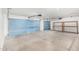 Spacious garage with automatic doors and storage shelves at 25536 W Primrose Ln, Buckeye, AZ 85326