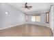 Large living space offers tile floors, lots of light, and neutral walls. Great for gathering at 25536 W Primrose Ln, Buckeye, AZ 85326