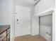 Mud room with white cabinets and direct access to garage at 25536 W Primrose Ln, Buckeye, AZ 85326