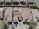 Overhead view of a neighborhood residence with solar panels and small backyard featuring low-maintenance landscaping at 28202 N Willemite Dr, San Tan Valley, AZ 85143