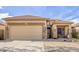 Single Gathering home featuring a two-car garage, desert landscaping, covered entry, and neutral color palette at 28202 N Willemite Dr, San Tan Valley, AZ 85143