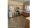 Traditional kitchen featuring stainless steel appliances and honey oak cabinetry at 28202 N Willemite Dr, San Tan Valley, AZ 85143
