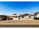 Charming single-story home featuring a well-maintained yard and classic architectural details at 3338 W Palmaire Ave, Phoenix, AZ 85051