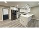 Updated kitchen features sleek stainless steel appliances and stunning marble countertops at 3338 W Palmaire Ave, Phoenix, AZ 85051