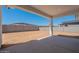 Private backyard with patio and block wall fence offering a secure outdoor living space and potential for landscaping at 3483 W Sunstone Dr, San Tan Valley, AZ 85144