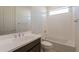 Clean bathroom featuring a white vanity, soaking tub, and neutral tones for a relaxing feel at 3483 W Sunstone Dr, San Tan Valley, AZ 85144
