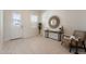 Bright foyer with stylish console table, decorative mirror, and attractive wood-look flooring at 3483 W Sunstone Dr, San Tan Valley, AZ 85144